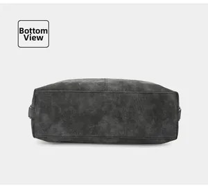 Detailed base view of dark grey matte handbag showing sturdy double-stitched seams