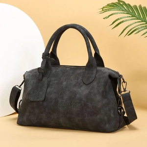 Minimalist charcoal grey boston handbag with top handles and adjustable shoulder strap