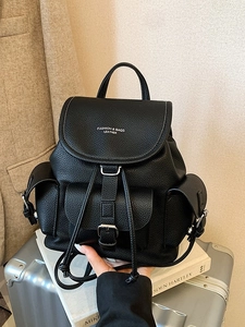 Vintage black lychee leather backpack with drawstring closure and external pockets