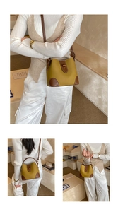 Three-way view of mustard yellow bucket bag with brown leather trim and metal lock