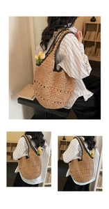 Detail showing the intricate hollow weave and black crochet trim on this straw tote bag