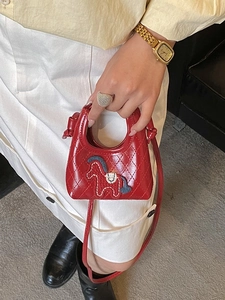 Mini red quilted crossbody bag with horse embroidery and elegant handle for women