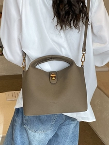 Litchi pattern leather bucket bag in khaki with adjustable strap for commuting
