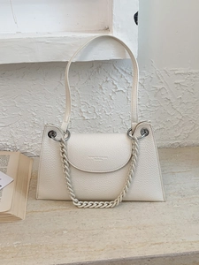 Chic milky white trapezoid handbag with lychee pattern and silver chain strap details