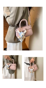 Pink lychee texture shoulder bag with cute white plush rabbit charm detail