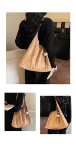 Macro detail of camel tote bag with grid texture and mini coffee cup charm pendant