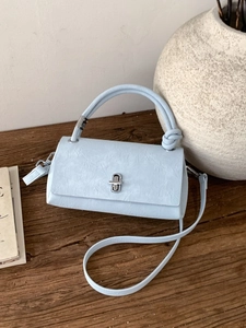 Light blue faux leather square handbag with knot handle and silver twist lock