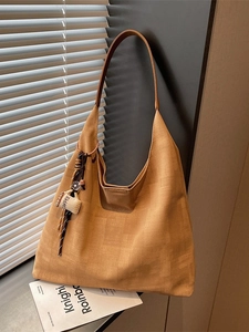 Retro brown canvas tote bag with coffee plush charm for daily stylish commuting
