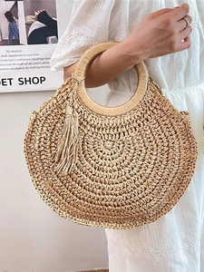 Sac de plage en paille tissé main avec anses rondes et pompon de couleur beige