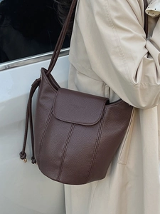 Brown litchi pattern leather bucket bag with flap cover and long shoulder strap