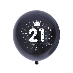 Detail of 12-inch black latex balloon with white 21st happy birthday and crown print