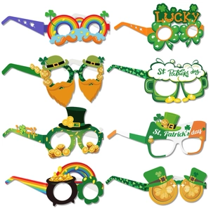 Set of 8 St. Patrick's Day paper glasses featuring green clovers and festive designs