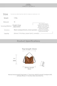 Detailed size specifications for brown leather tote bag with 112cm adjustable strap