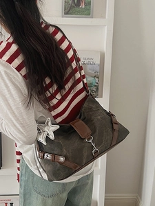 Fashionable dark coffee hobo bag with silver star pendant and brown leather trim detailing