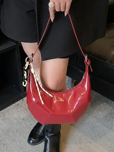 Retro glossy red crescent shoulder bag with LOVE & DESIRE text and decorative chain
