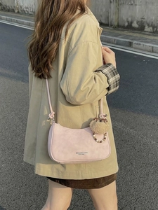 Pink crescent hobo bag with a cute bear charm for women crossbody or shoulder wear