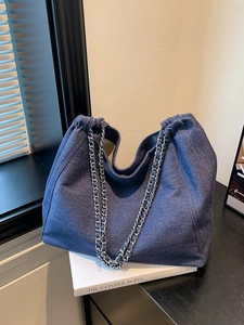 Large capacity denim tote bag with metal chain straps and pleated design for women