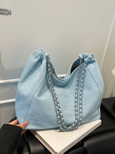 Large capacity light blue denim tote bag with silver chain straps and soft gathered design