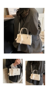 Detail of white crocodile texture handbag featuring a floral silk scarf wrapped handle