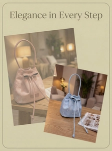 Close-up of pink and blue lace embroidered bucket bags with elegant drawstring bows