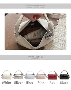 Detail view of internal structure and multiple color options for the minimalist handbag
