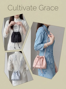 Three elegant bucket bags with floral embroidery in black, light pink and grey colors