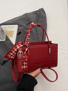 Dark red crocodile pattern handbag with checkered scarf handle and silver hardware
