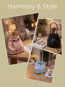 Detailed embroidery and lace patterns on a stylish bucket bag with ribbon bow detail
