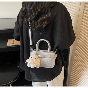 Silver mini square bag with metallic finish and cute white plush bunny charm detail