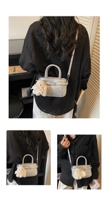 Silver metallic mini tote bag featuring a cute white bunny charm and adjustable strap