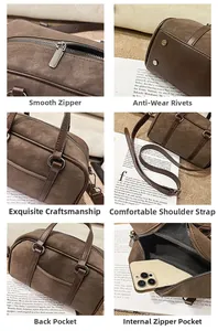 Detailed close-up of retro brown Boston bag showing zipper and durable metallic hardware