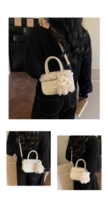 Detailed view of cream white crossbody bag featuring a cute plush bunny charm with pearls