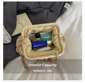 Internal view of hollow woven shell bag showing capacity for phone and cosmetics