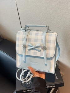 Blue and white checkered handbag with bow decoration and detachable shoulder strap