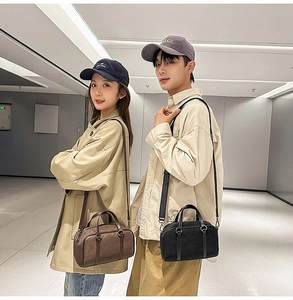Brown and black Boston bags shown on models with detachable straps and top handles