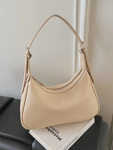 Minimalist cream litchi grain leather hobo shoulder bag with silver buckle detail