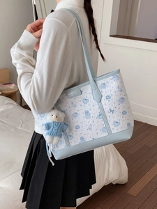 Cute large capacity tote bag with cartoon bear pattern and plush bear charm for daily use