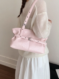 Fashionable light pink wrinkled shoulder bag with metallic buckle and eyelet strap