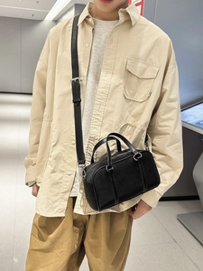 Classic black matte Boston shoulder bag for men with silver zippers and wide strap