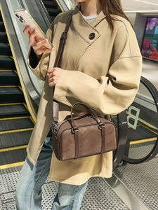 Vintage dark brown Boston handbag in matte suede with adjustable shoulder strap and top handle