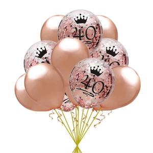 Detail of 12-inch rose gold and confetti latex balloons with crown and number 40 print