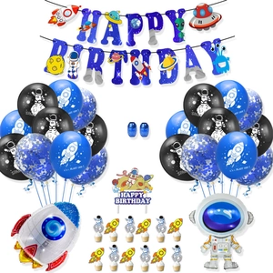 Space birthday party kit with astronaut banner, rocket balloons, and themed cake toppers