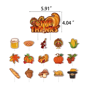 Detail showing 16 Thanksgiving cake toppers including Give Thanks turkey and pumpkin designs
