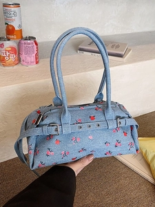 Light blue denim bowling bag with red floral print and dual handles for women