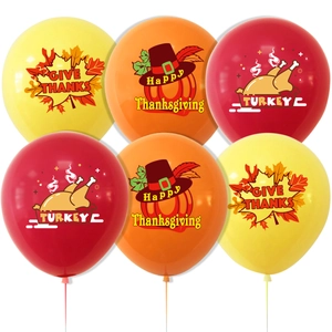 Close-up of Thanksgiving latex balloons featuring festive maple leaves and turkey patterns