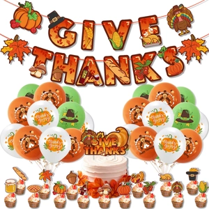 Thanksgiving party decorations set with Give Thanks banner, turkey balloons and cake toppers