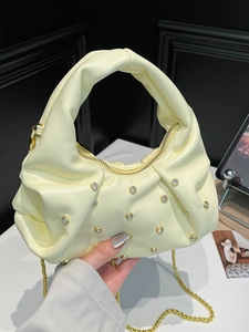 Chic light yellow ruched horn bag with rhinestones and gold chain strap handle