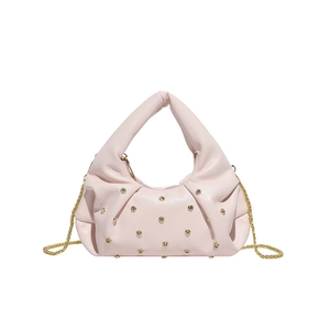 Pink pleated handbag with sparkling rhinestone accents and a gold chain strap