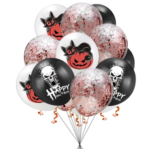 Detail of Halloween latex balloons with skull and cat pumpkin prints and rose gold confetti