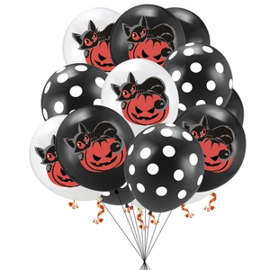 Detail of Halloween balloons with black cat and pumpkin lamp prints for party decoration